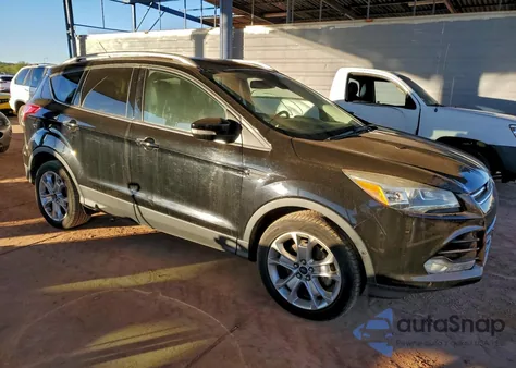 2016 Ford Escape Titanium z USA, uszkodzony, nr VIN 1FMCU9JXXGUA65101